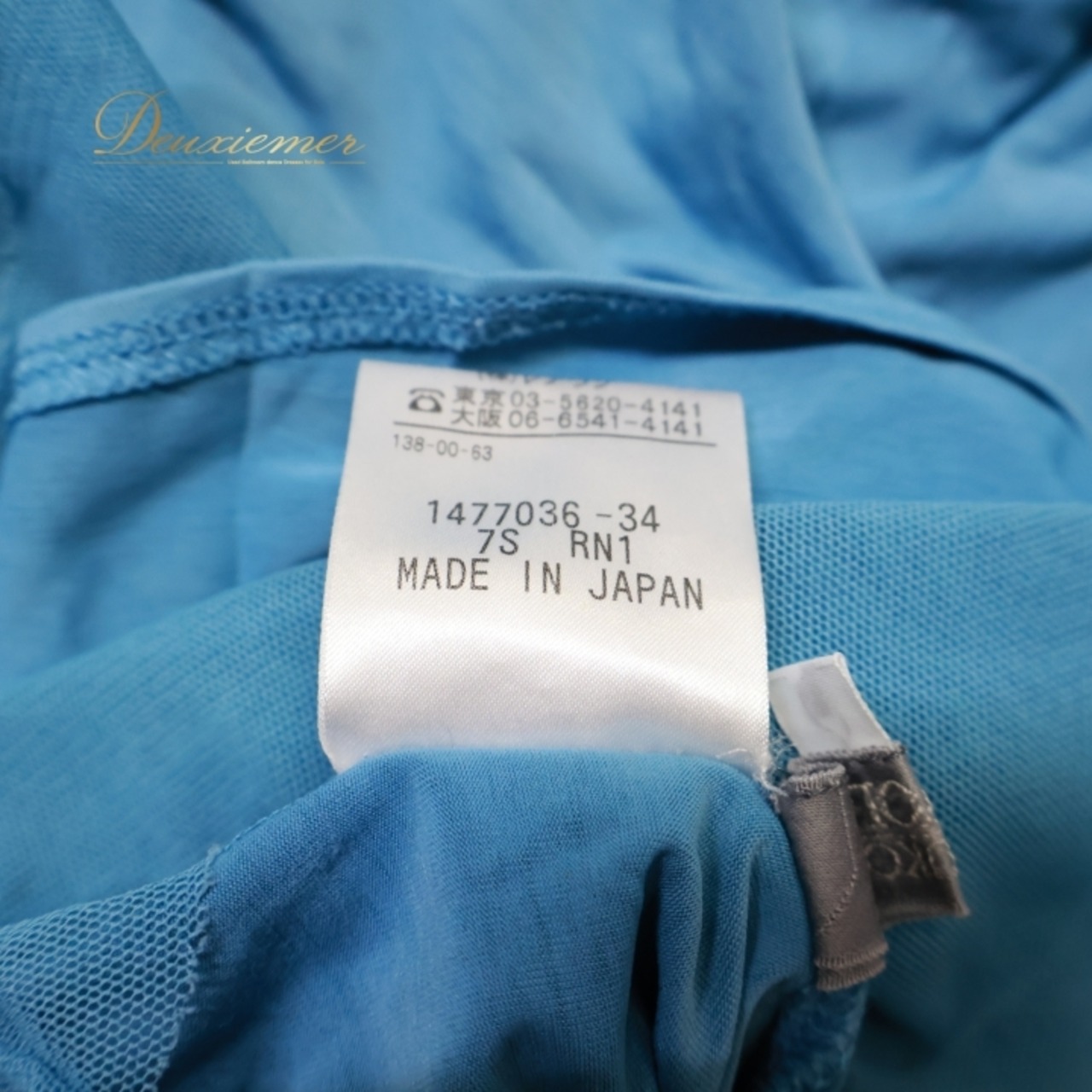 レディース トクコプルミエヴォル TOKUKO 1er VOL トップス ブラウス ブルー系 日本製 水色 無地 シンプル 伸縮 ストレッチ ハイネック タートルネック メッシュ生地 かわいい くすみカラー カジュアル 普段着 おしゃれ お出かけ 長袖