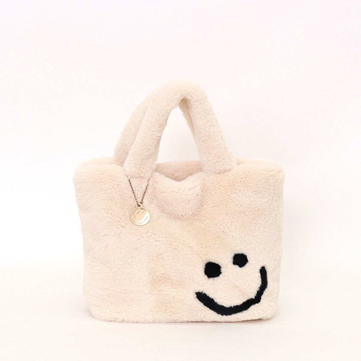 【クーコ COOCO】SMILEY ﾁｬｰﾑ付きｴｺﾌｧｰﾌｪｲｽﾄｰﾄﾊﾞｯｸﾞ ベージュ