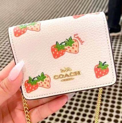 早い者勝ち　COACH いちご柄 折り財布