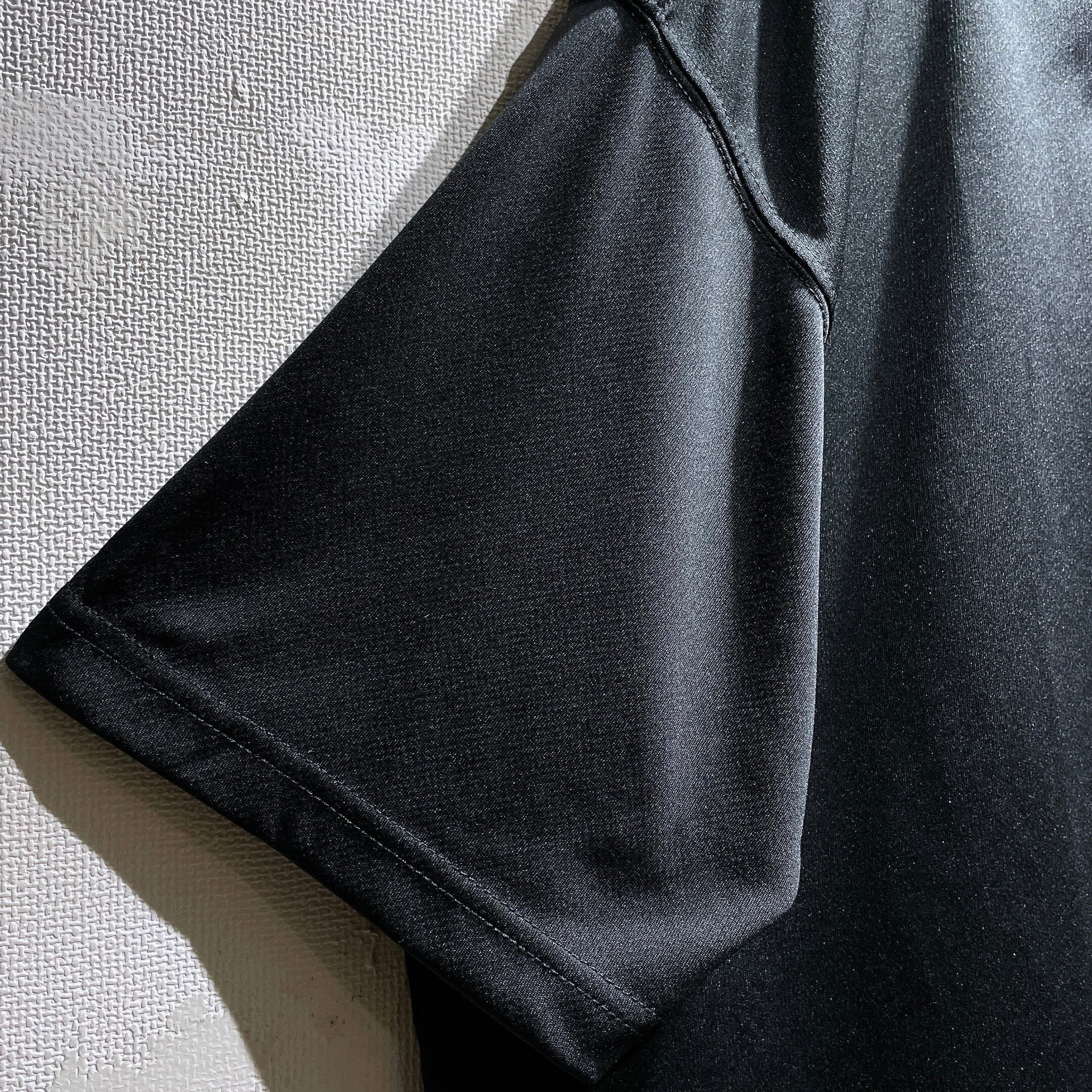 ” Travelling August ” character printed Black SS Tee (10th Anniversary)