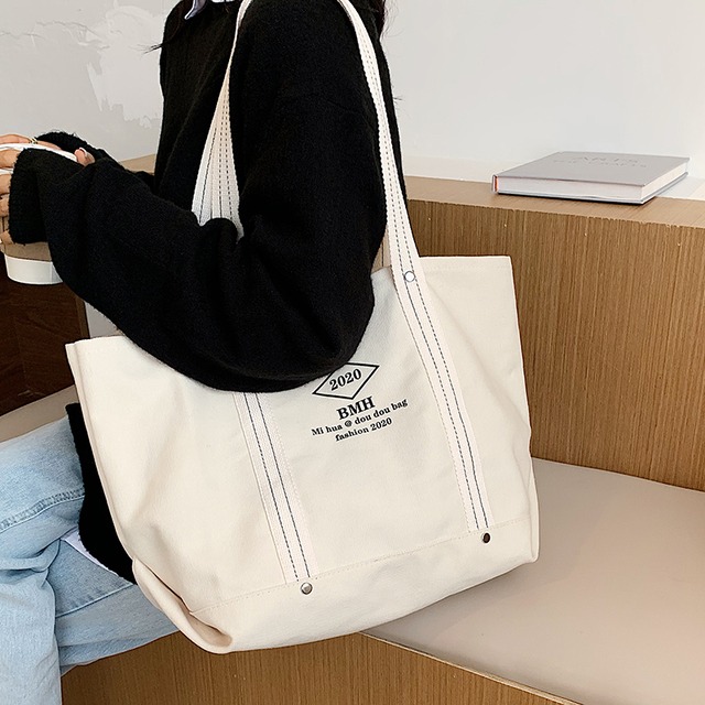 バッグレディース大容量2020新しいトレンディなネットレッドイーズキャンバスバッグワイルドショルダーバッグ学生カジュアルトートバッグ Tiancai_Wing_Bag41191827895