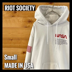 【RIOTSOCIETY】USA製 NASA ロゴ ワンポイント バックプリント 袖プリント 星条旗 プルオーバー パーカー US古着