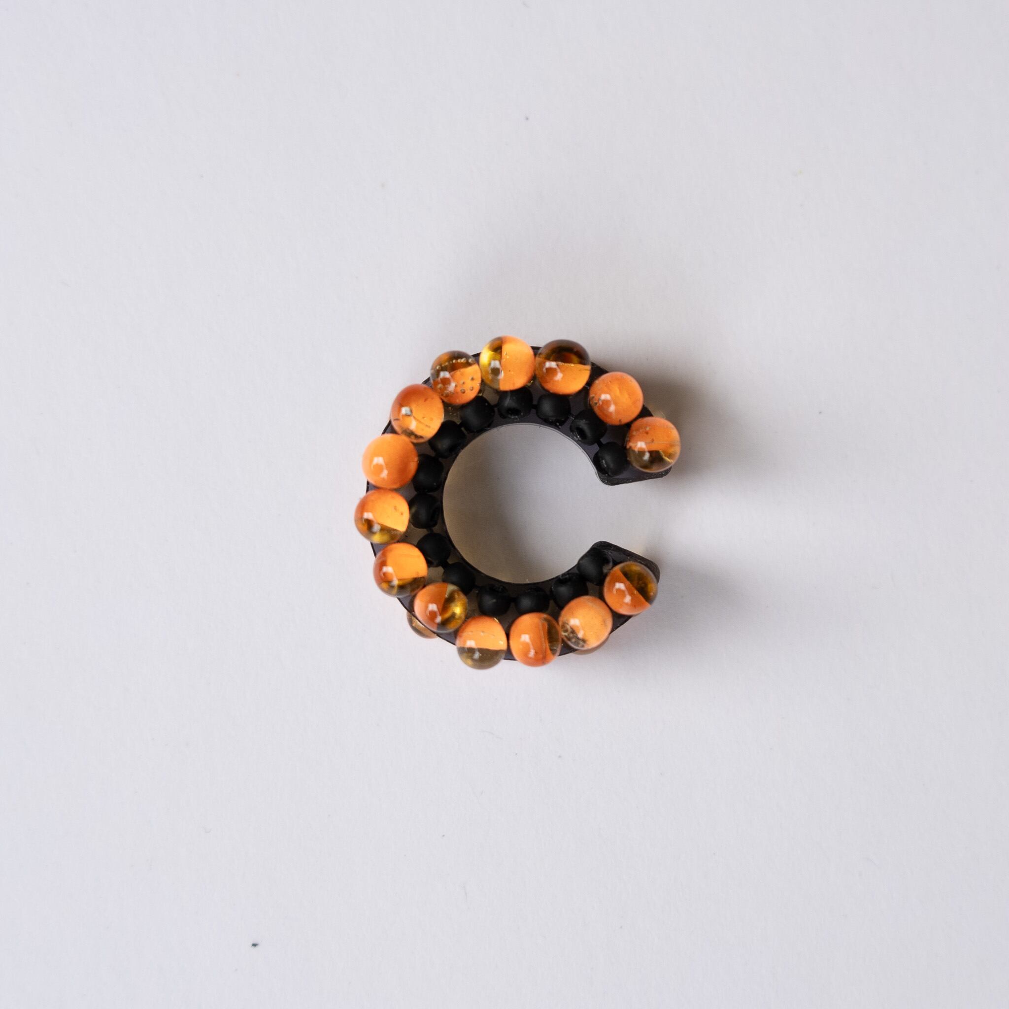 puzzle ring ear cuff [63]