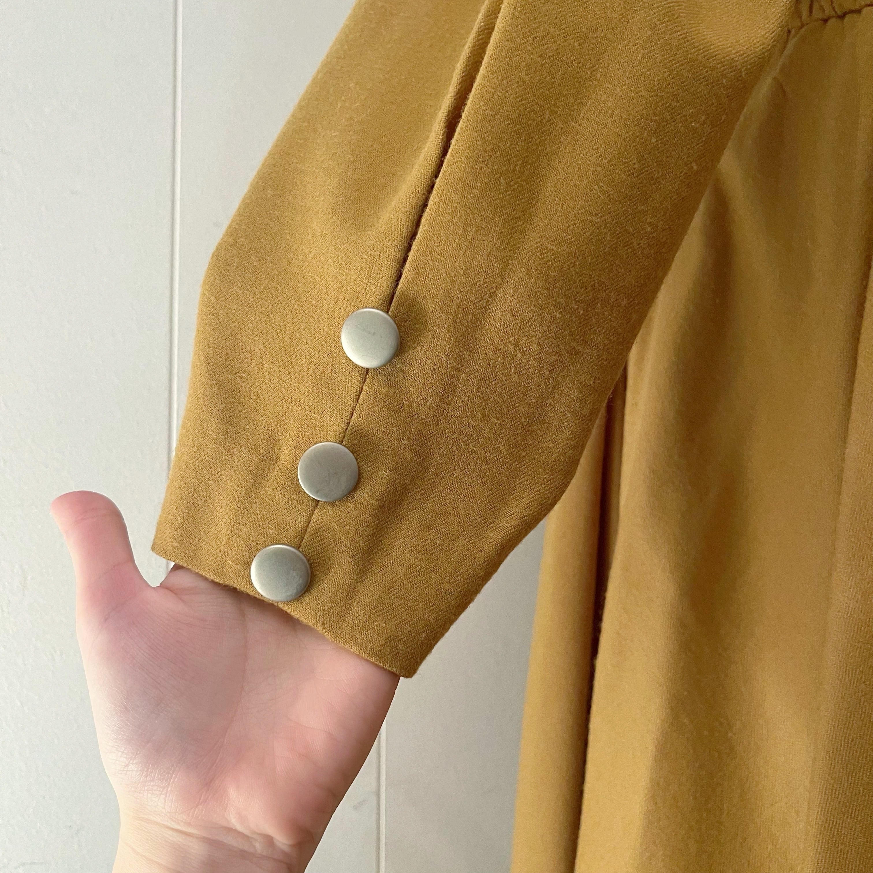 mustard front metal button one-piece