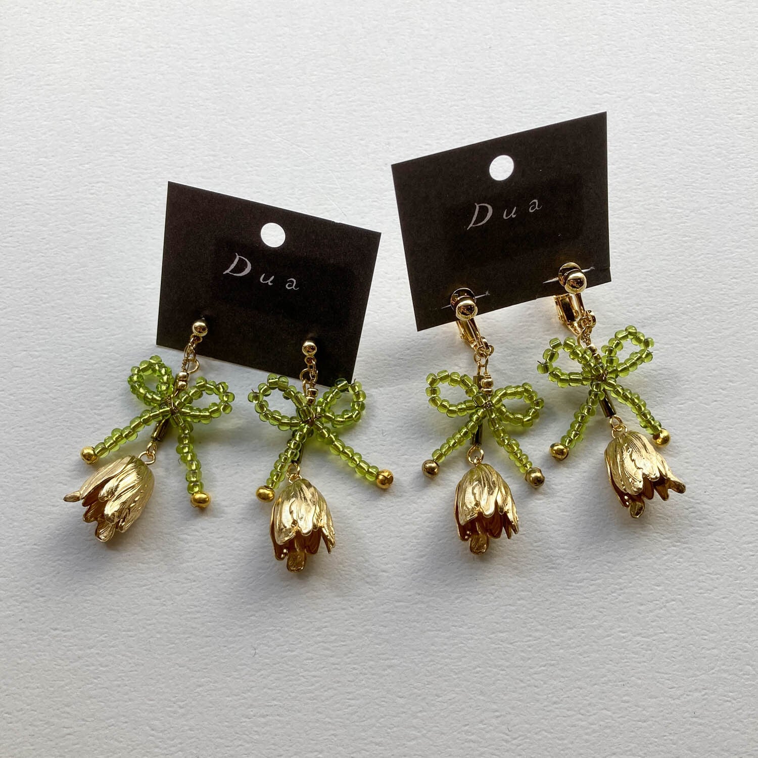 ビーズリボンとフラワーキャップの〈ピアス/イヤリング〉 | Dua