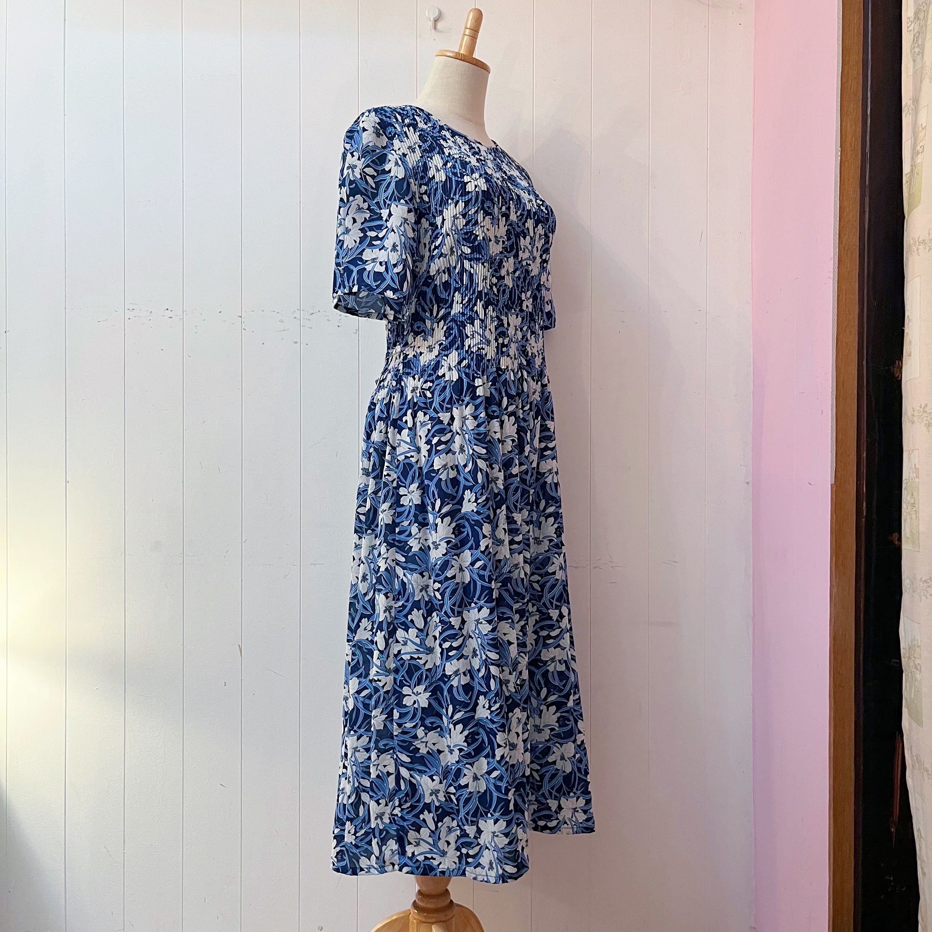 white lily blue pleats one-piece