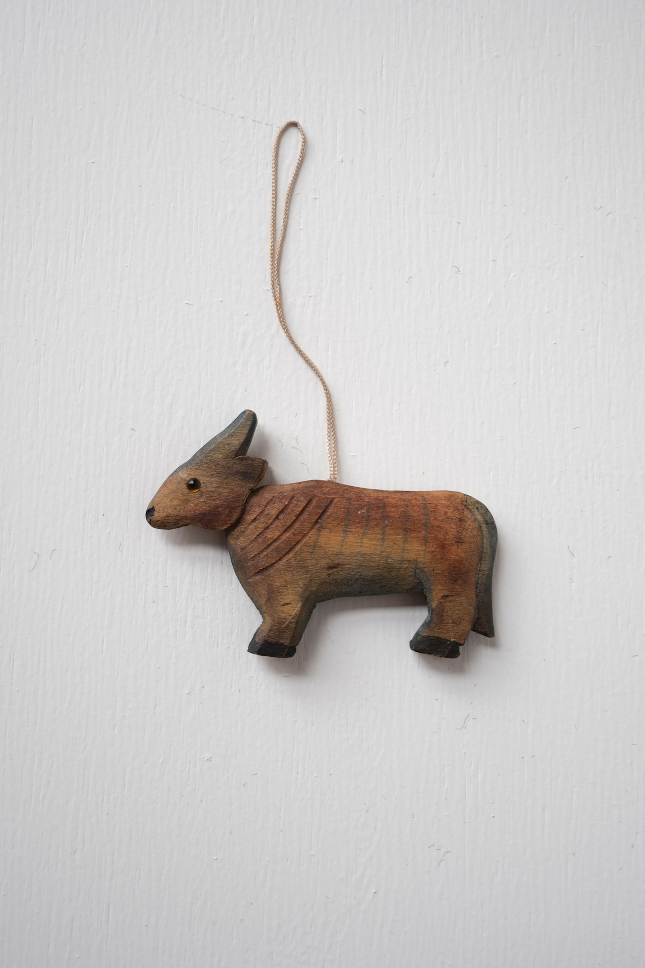 Hand carved moose ornament