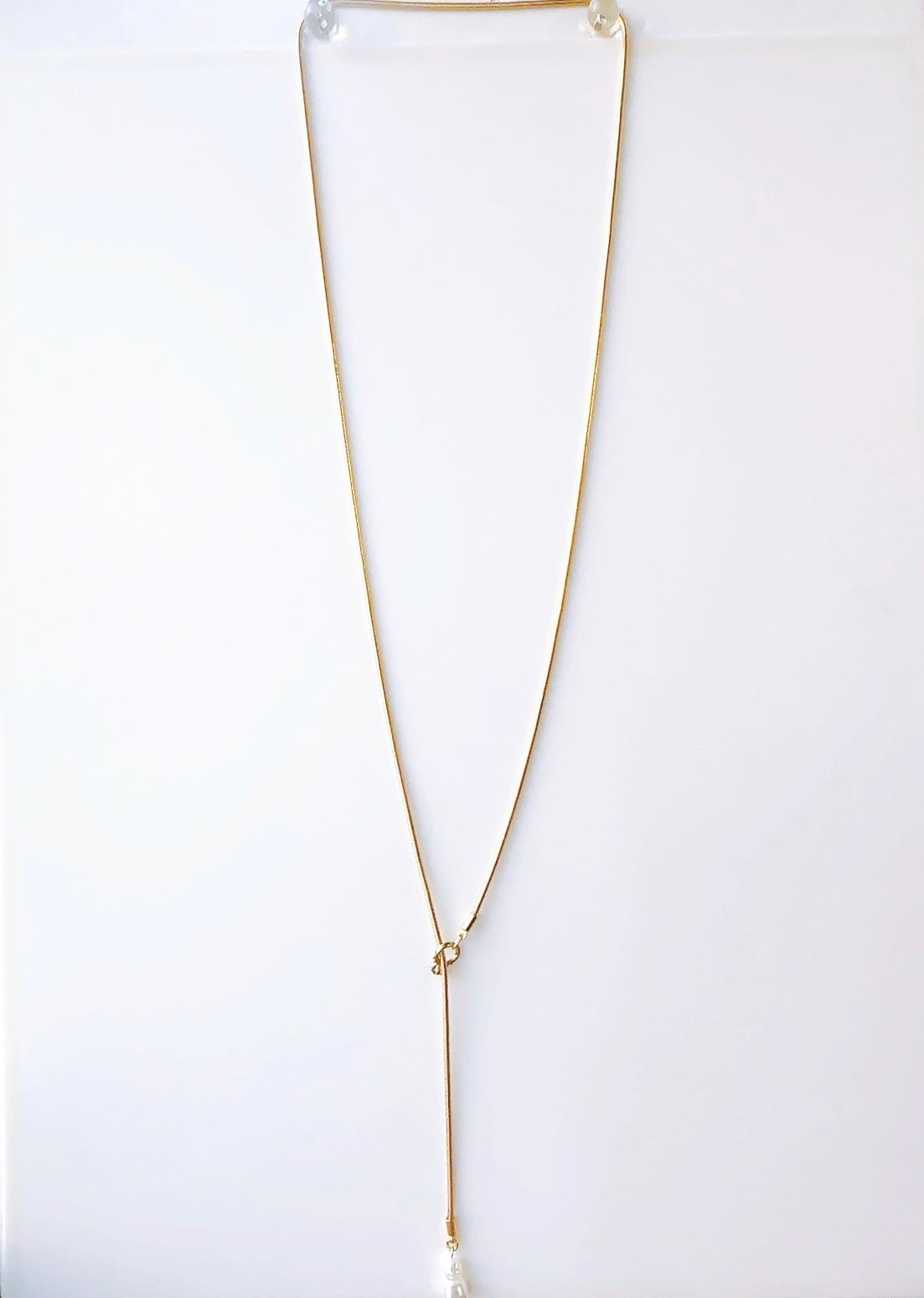 指輪チャームがポイント☆ゴールドチェーンロングラリエット