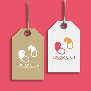 見つめ合う「い」のカプセルのロゴ