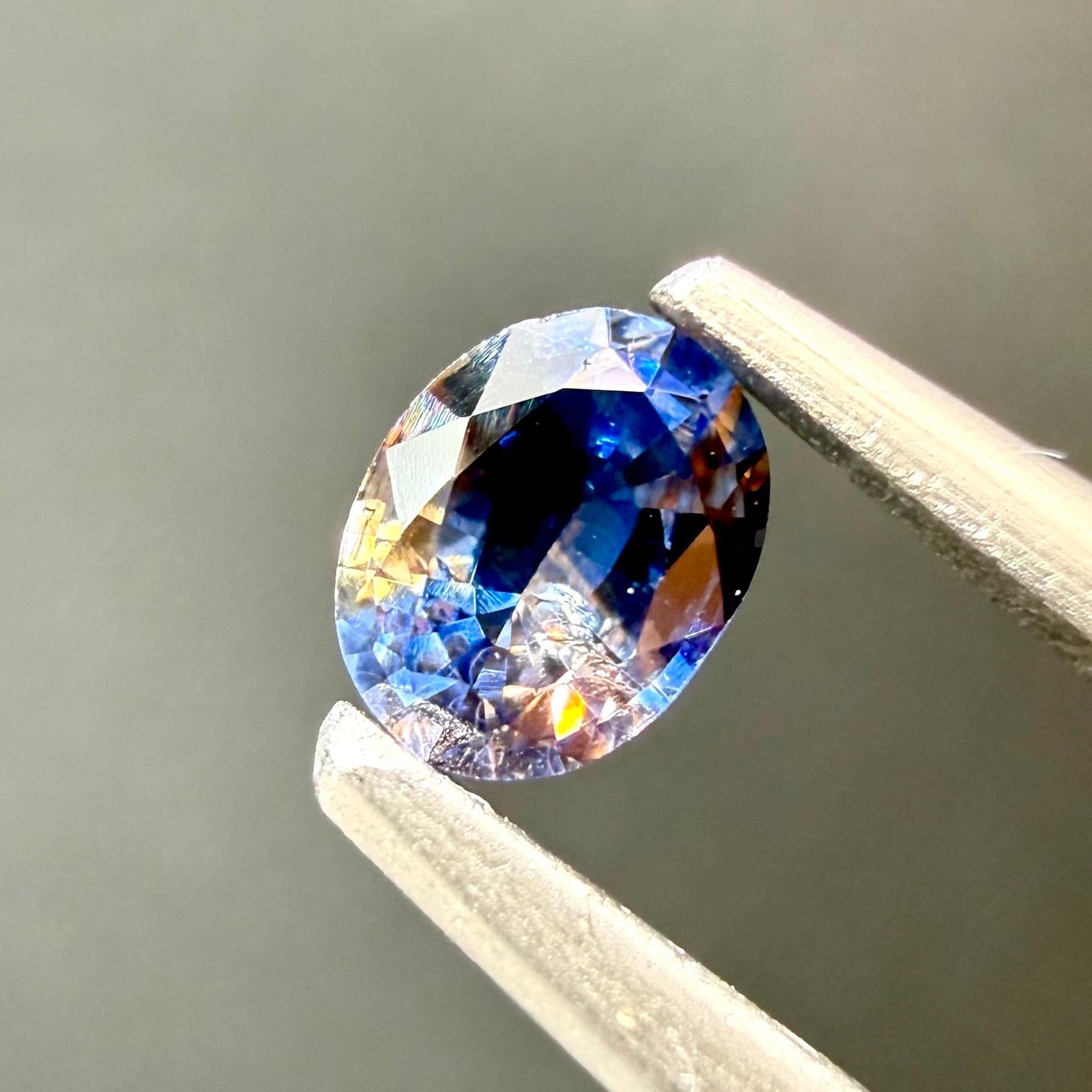 スリランカ産バイカラーサファイアオレンジ×ブルー0.29ct 4.46×3.5