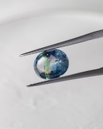 バフトップオーバルカット10×8mm #651【硝子の宝石】箔入