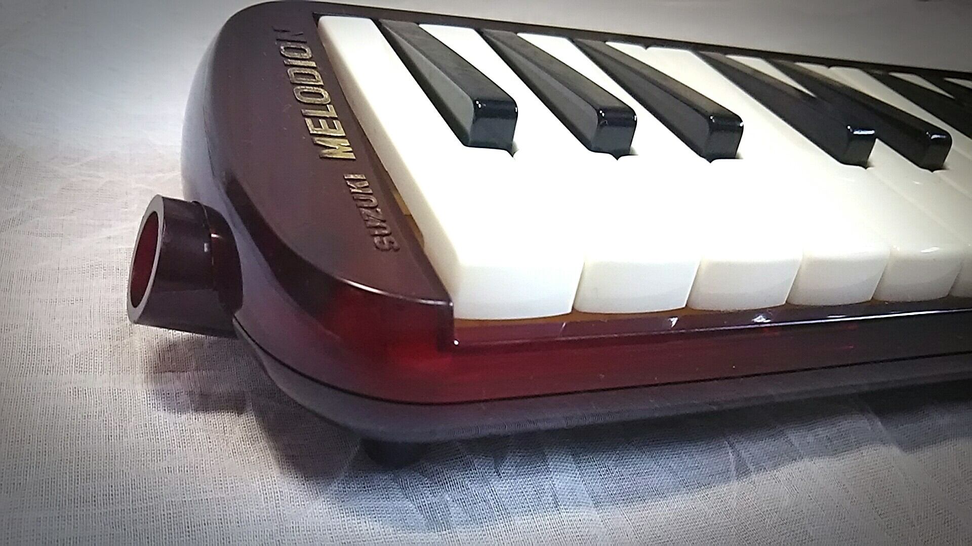 中古〕MELODION32 レッドスケルトン | おもちゃ楽器.com