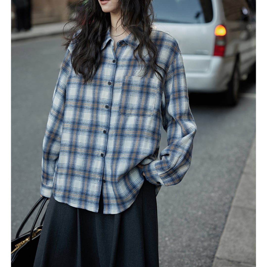 long sleeved blue plaid shirt