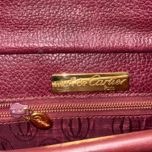 vintage CARTIER bordeaux half moon leather bag