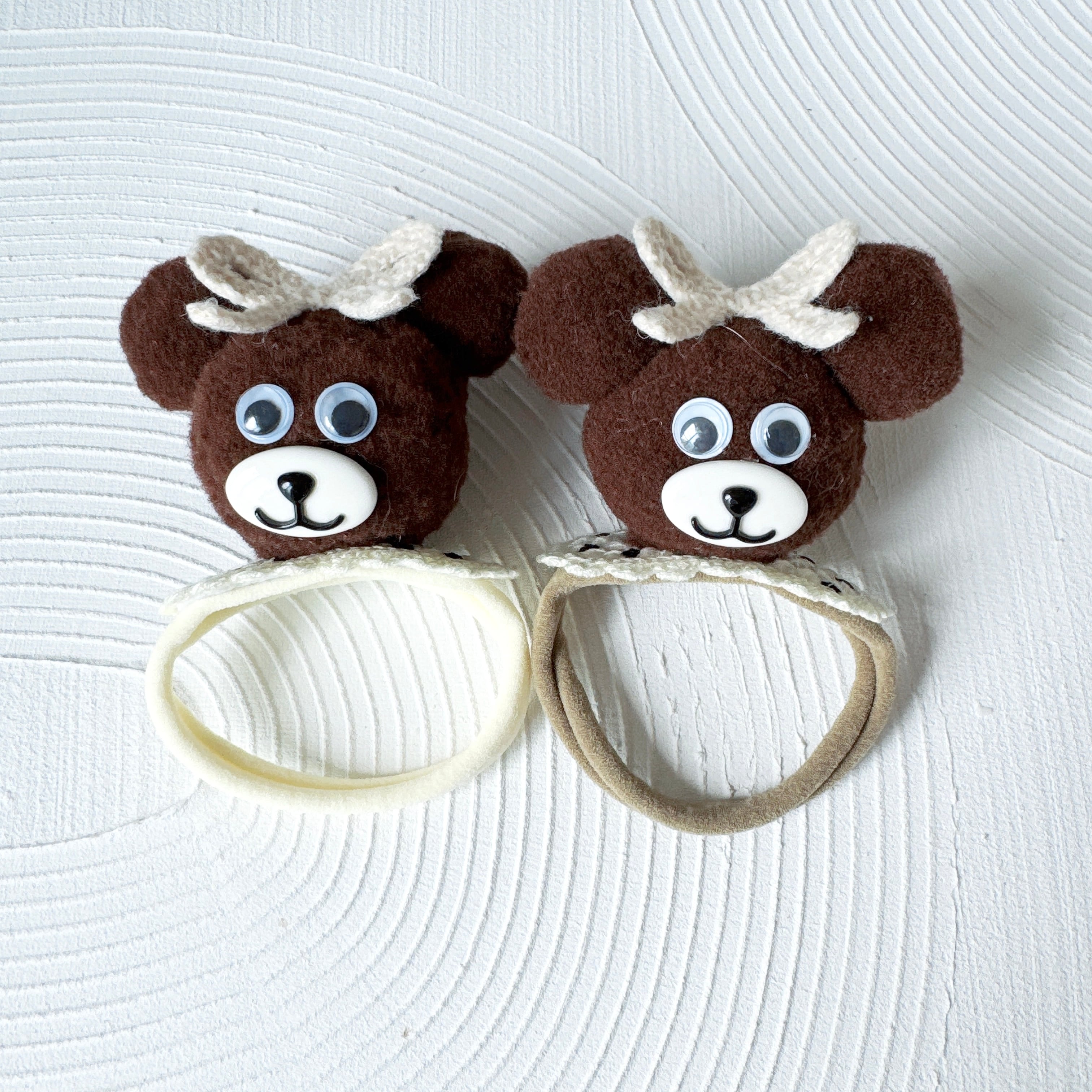 ホワイトリボンの大きなクマさんヘアバンド