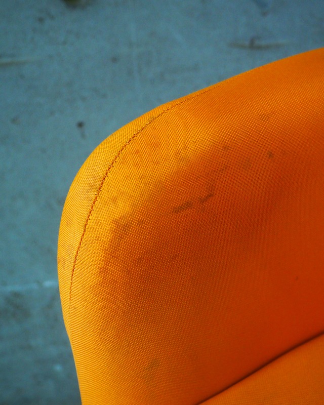 Orange swivel/height-adjustable shell-style personal chair