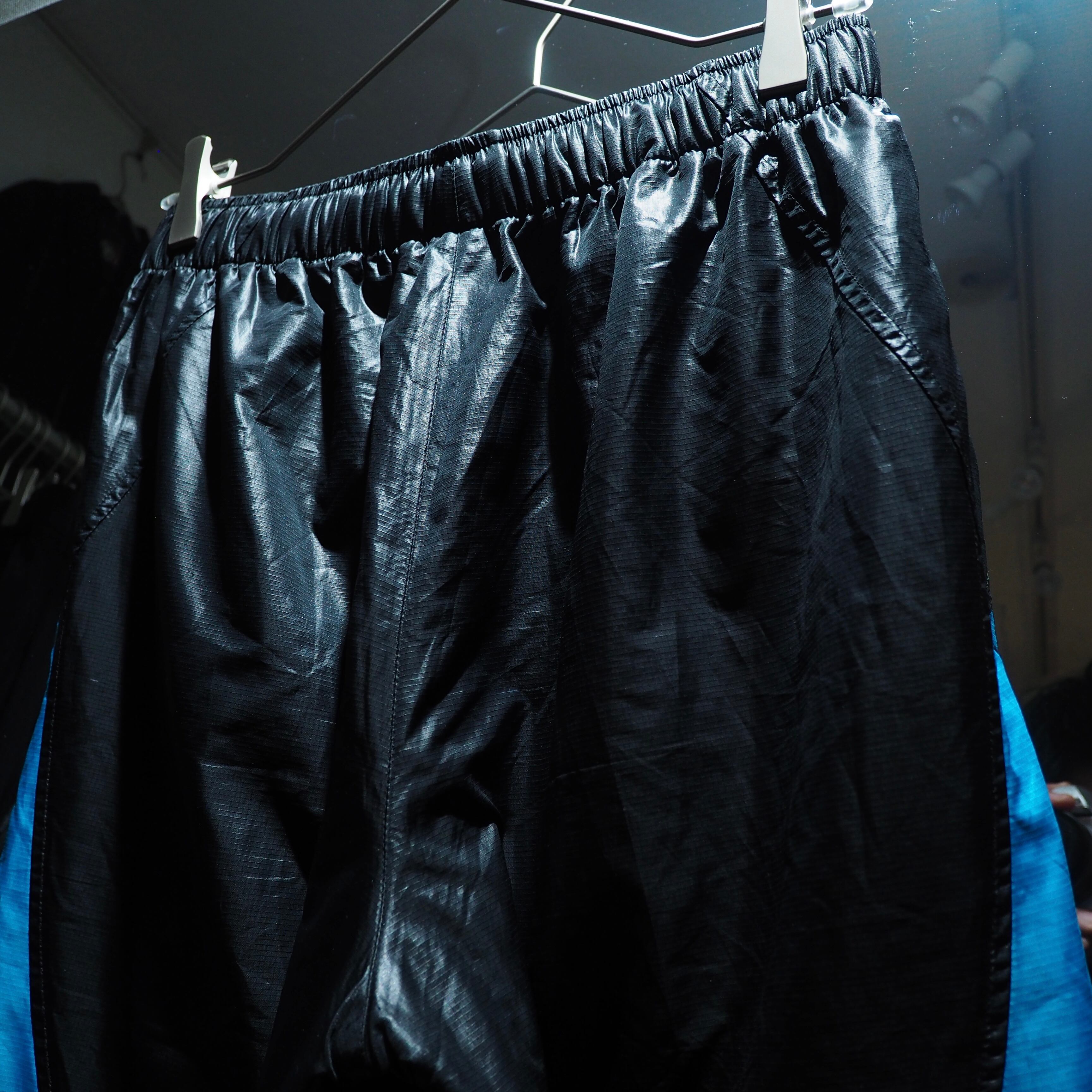 Dark Pink × Neon Blue color panel Switching Cyber track pants