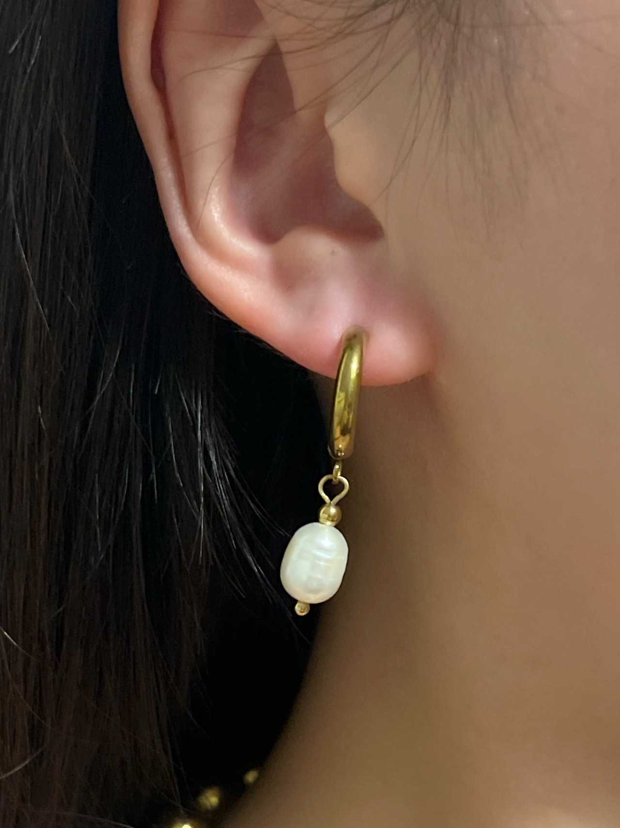 Fresh pearl hoop pierce