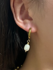 Fresh pearl hoop pierce