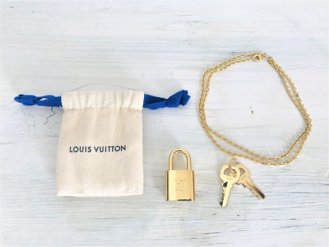 LOUIS VUITTON Padlock GOLD