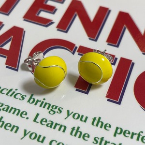 Tennis ball pierces