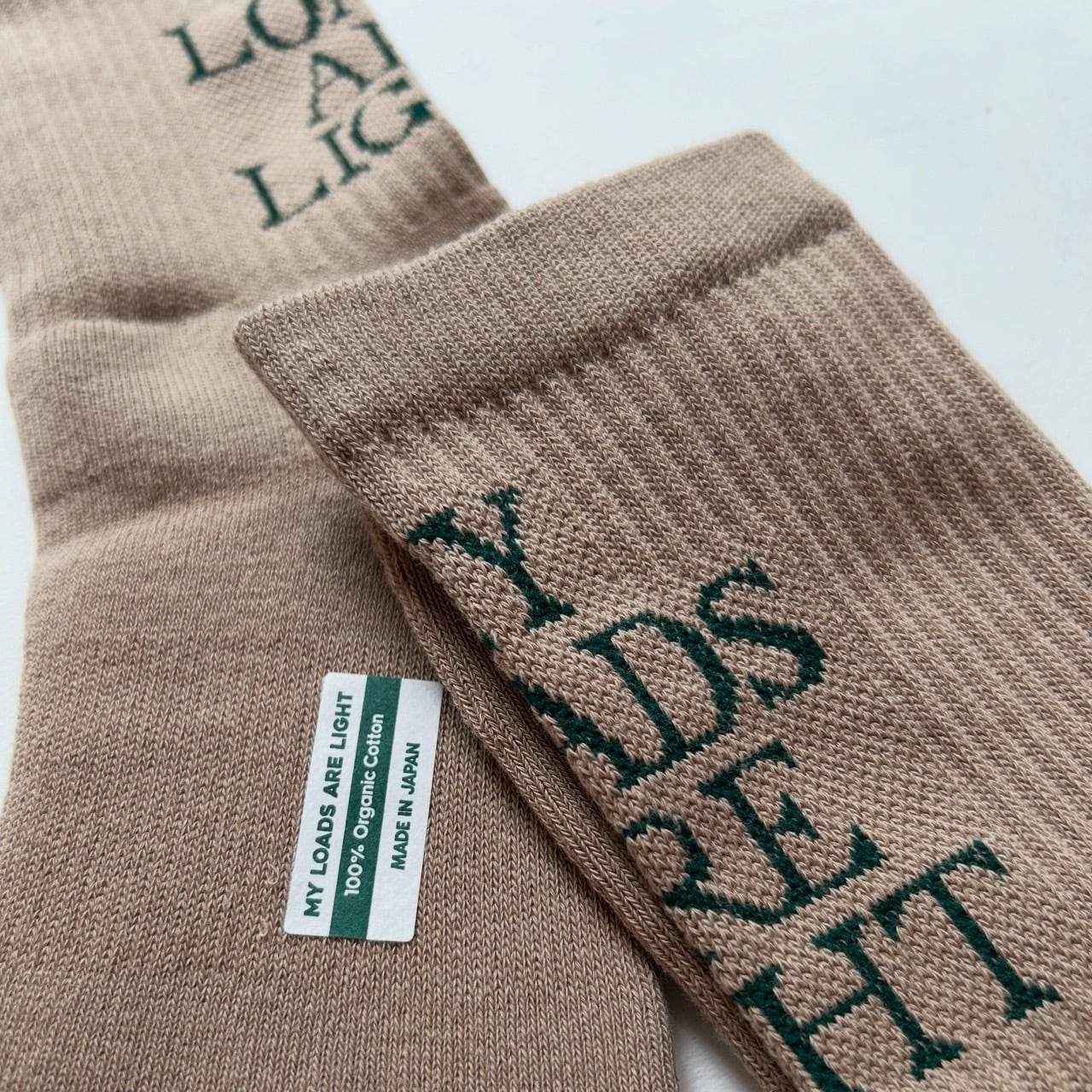 MY LOADS ARE LIGHT - TEXT “M.L.A.L” Socks | stacks bookstore