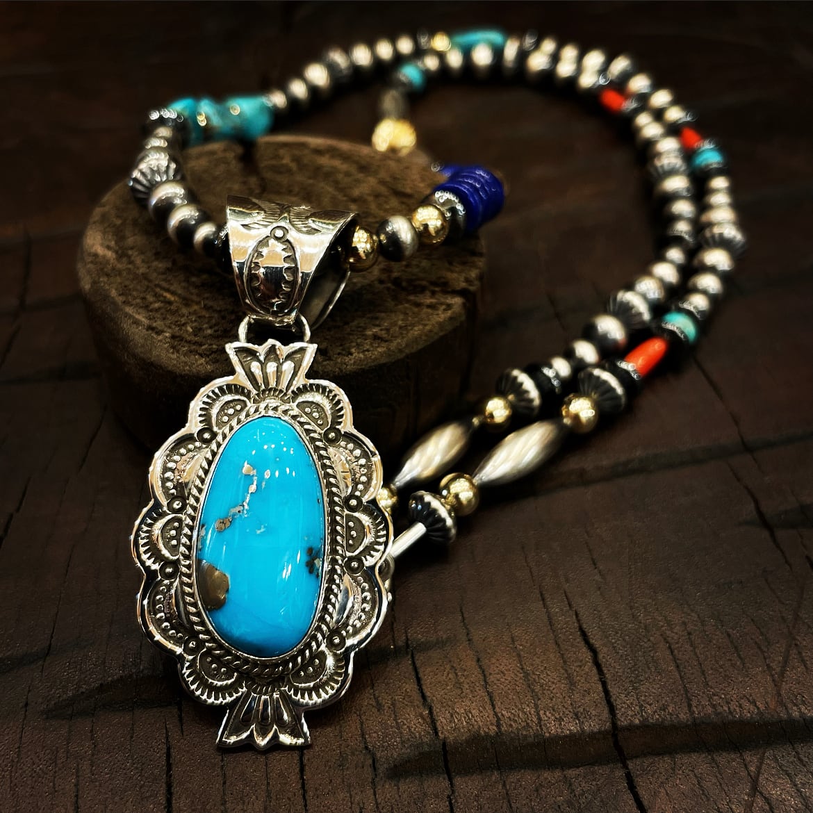 イサカピークターコイズスタンプワークシルバーバングル