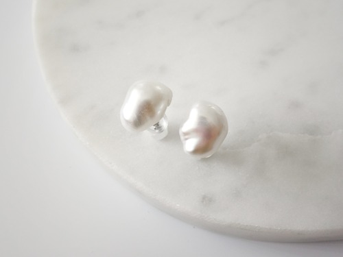 one baroque pearl pierce