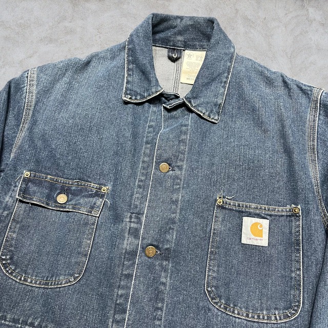 90’s Carhartt Michigan Denim Chore Coat curb