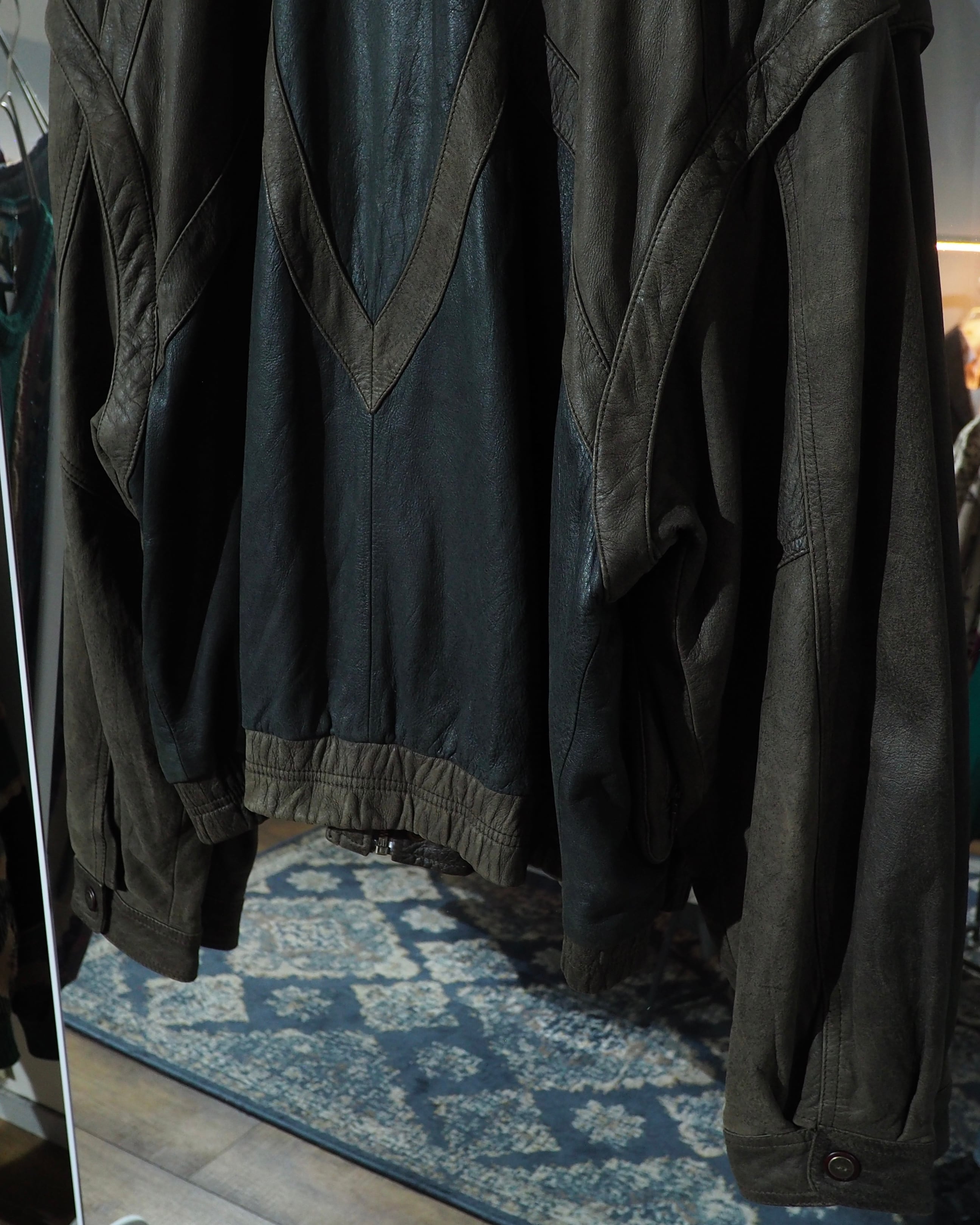 " 変形 × 分離 " Sleeve Detachable Gimmick × Panel Switching Vintage Loose Leather Jacket