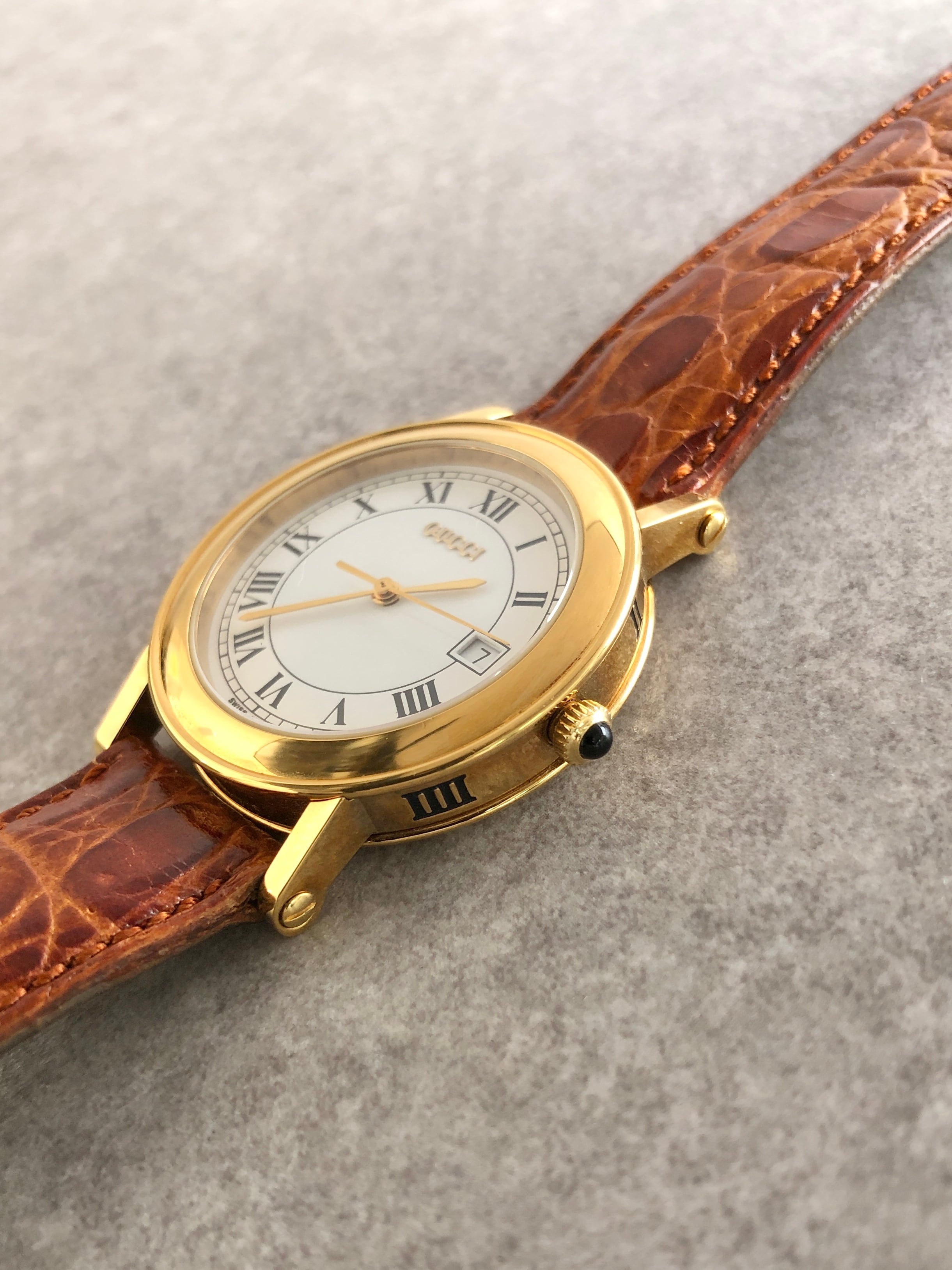GUCCI グッチ 腕時計 ゴールド×ブラウン ローマ文字 型押しレザー