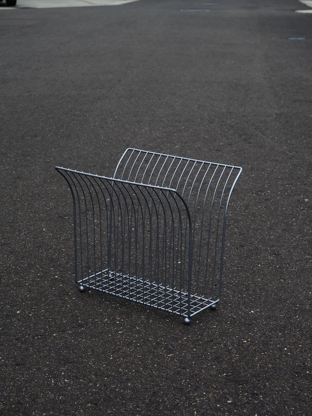 Grey wire magazine rack
