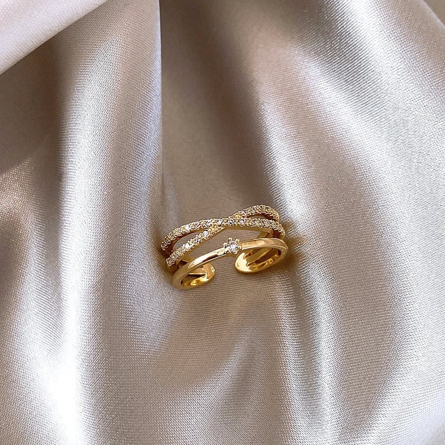 アクセサリー リング 調整可能 幾重にもクロスするオープンデザイン ゴールデン色