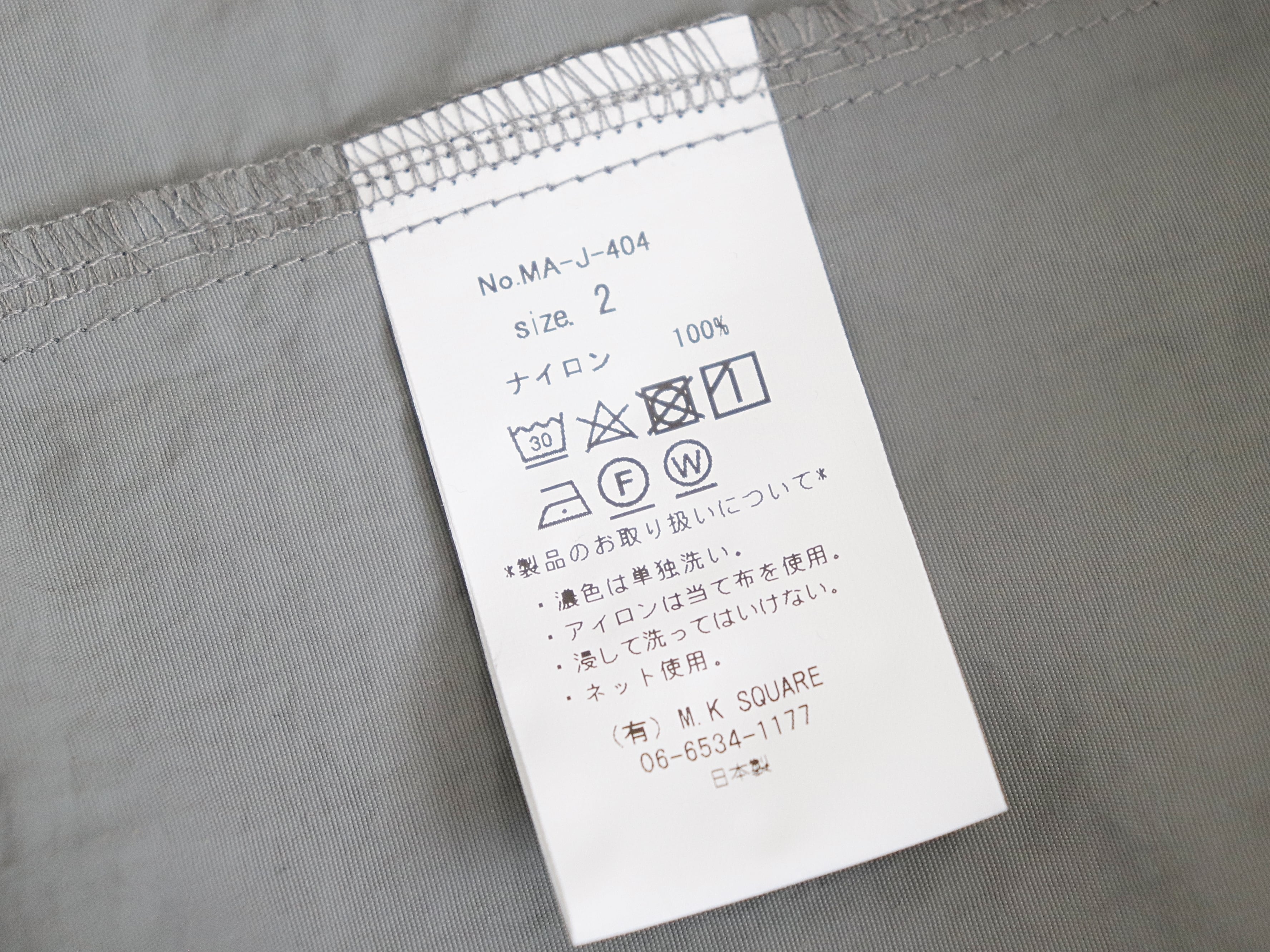 MANUAL ALPHABET / LIGHT SHELL SNAP TEE - GREY マニュアル