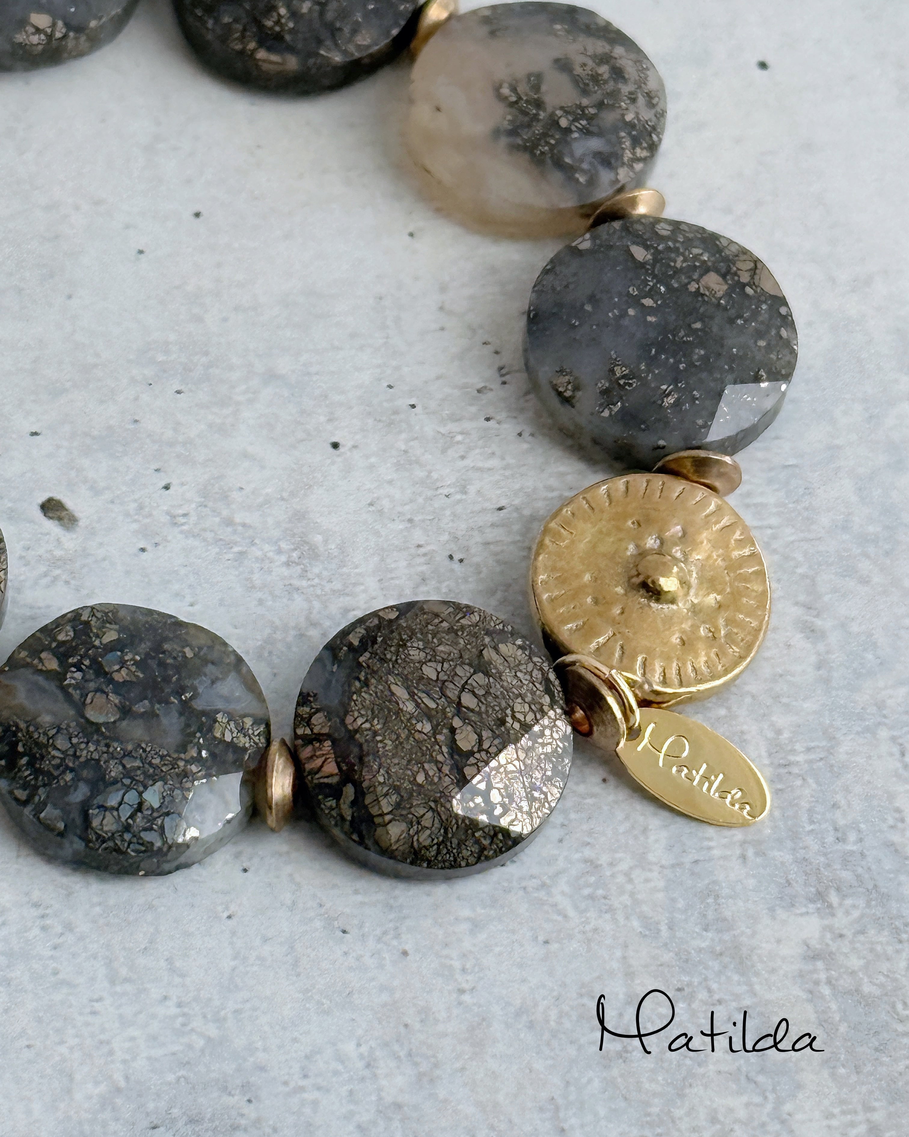 tumble bracelet(ニポモマーカサイト)