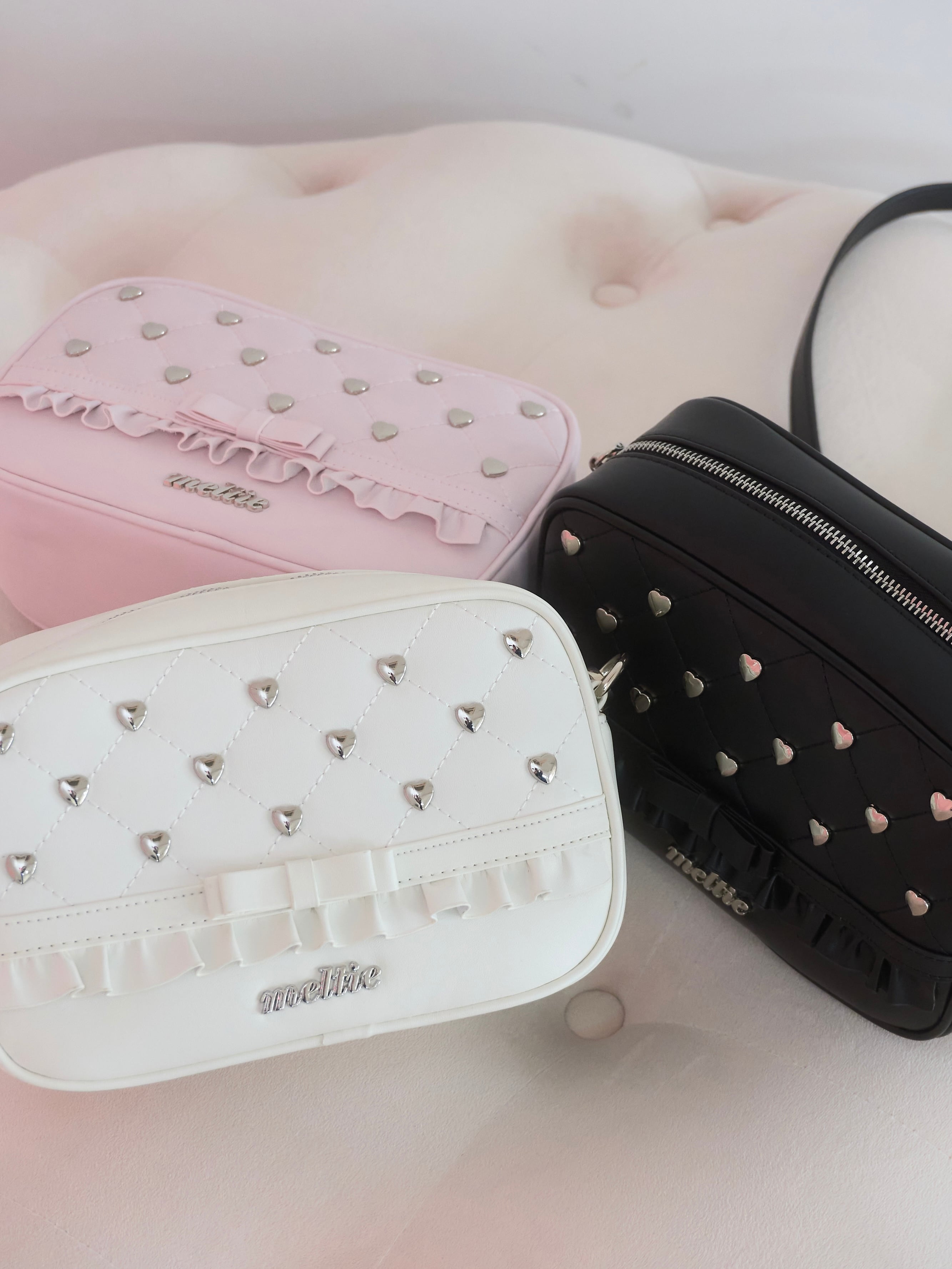 heart studs leather bag