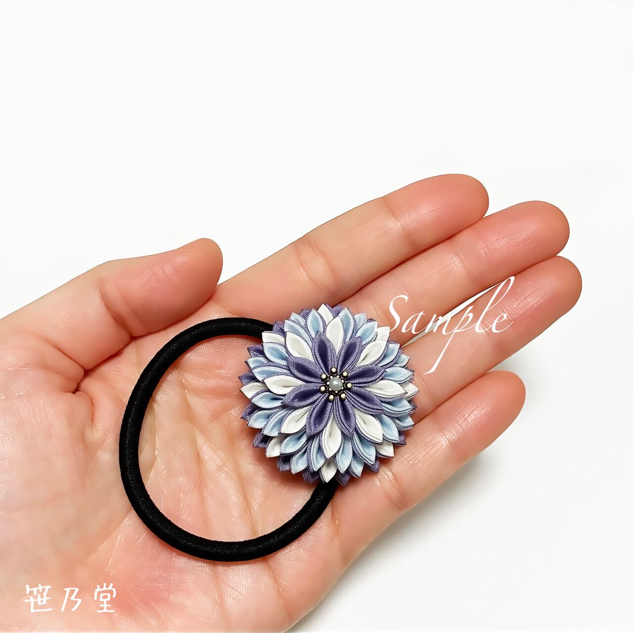 販売休止一つ430円 ハンドメイドお花のヘアゴムチチカカ系
