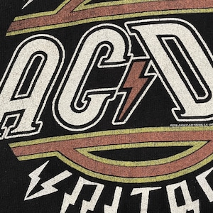 【AC/DC】HIGH VOLTAGE バンド 音楽 ロゴ プリント パーカー スウェット プルオーバー フーディー X-LARGE ビッグサイズ US古着