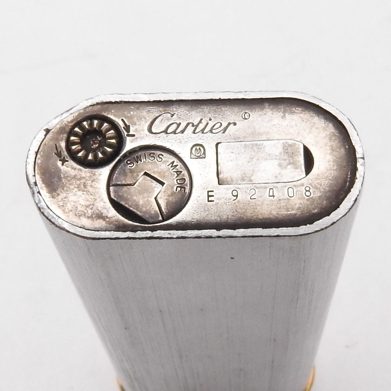 着火確認済み】Cartier カルティエ ヘアライン オーバル ロゴ刻印