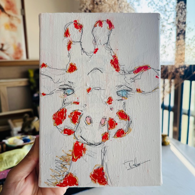 「ちょっとくらい甘えさせて」キリンの子供