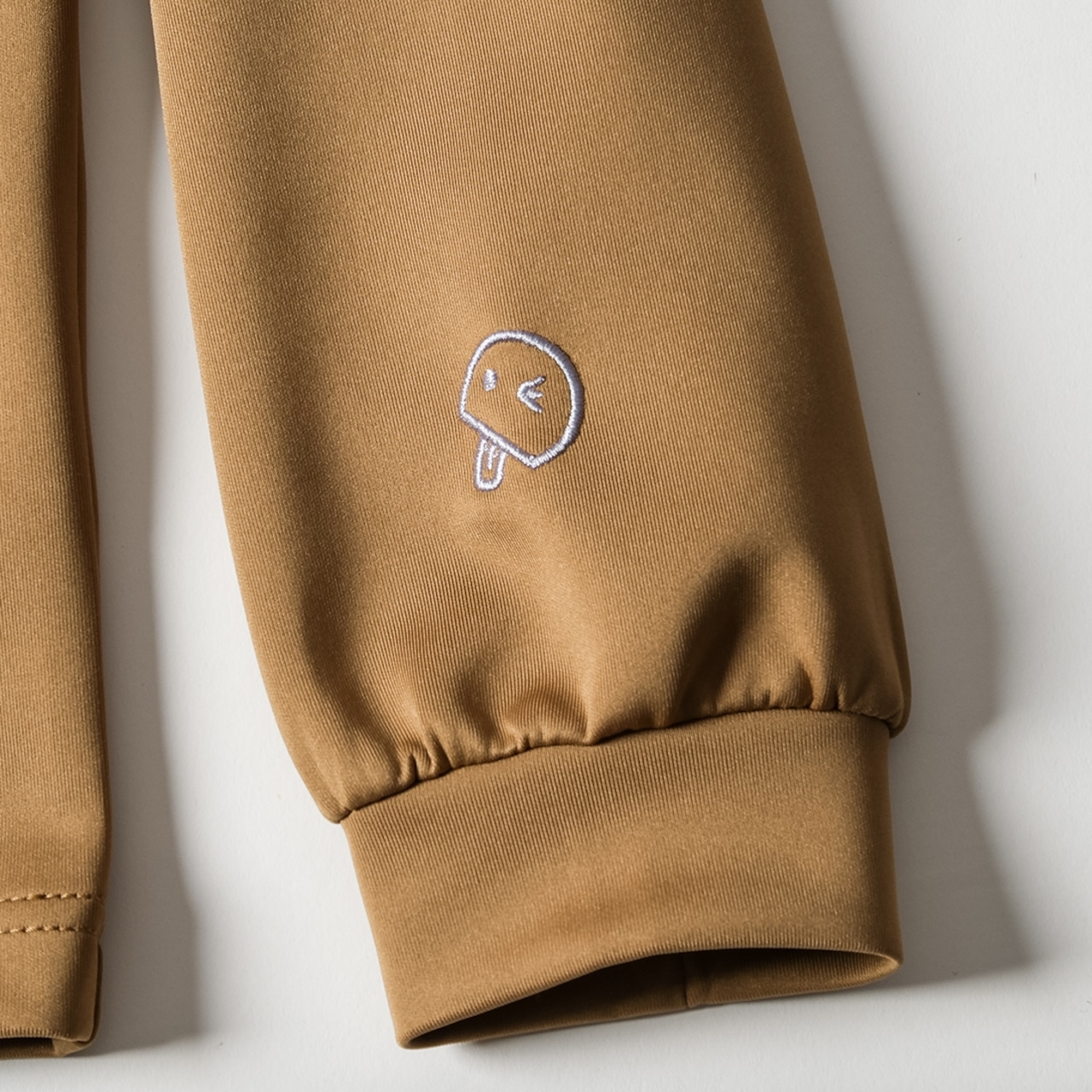 スタンドカラートップス