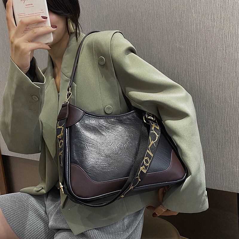 香港スタイルのレトロなレディースワンショルダーアンダーアームバッグ女性2020新しい流行のファッションネットレッド大容量オールマッチメッセンジャーバッグ Tiancai_Wing_Bag86889114525