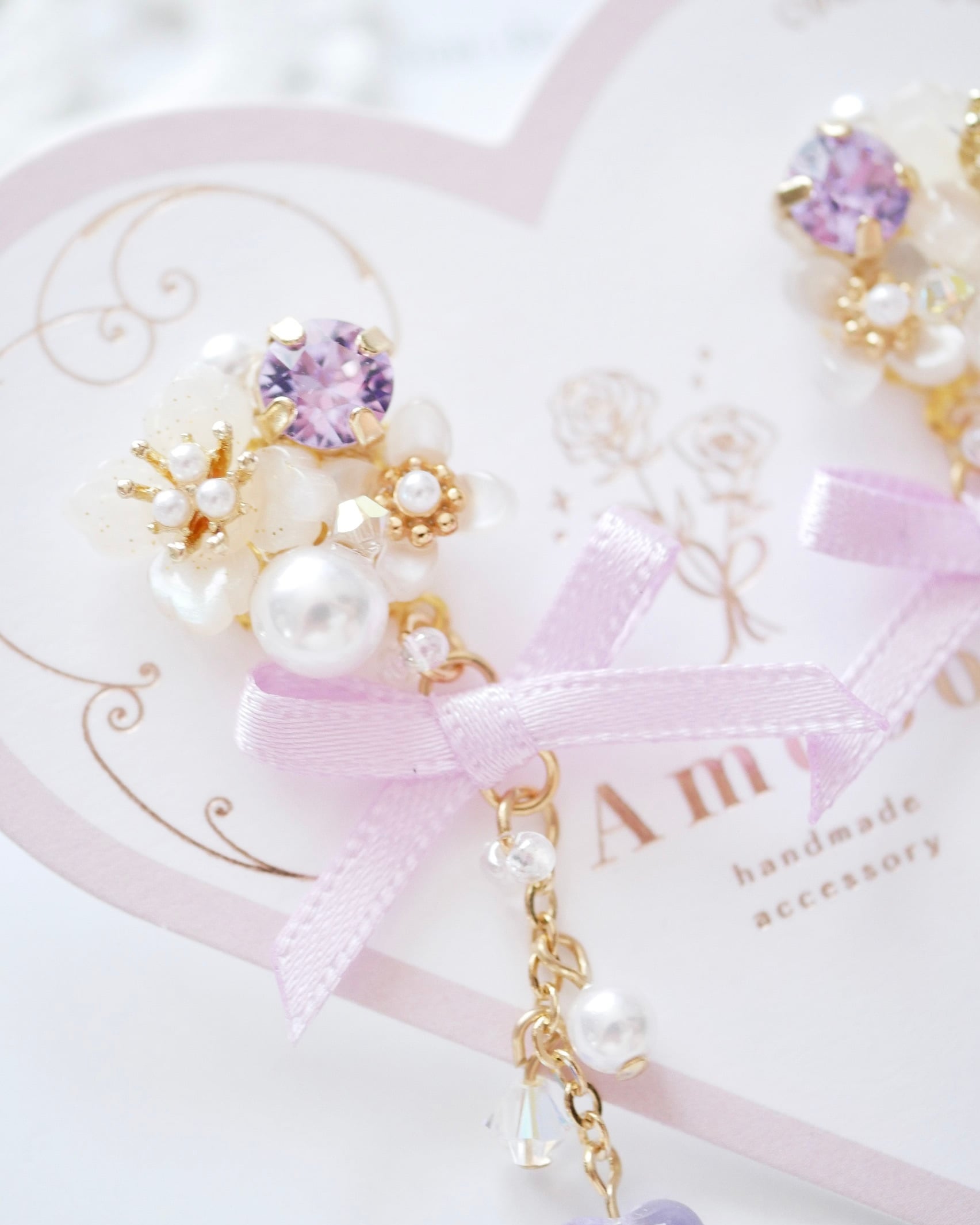 8507 フェアリスリボンビジューピアス/イヤリング | Amooo