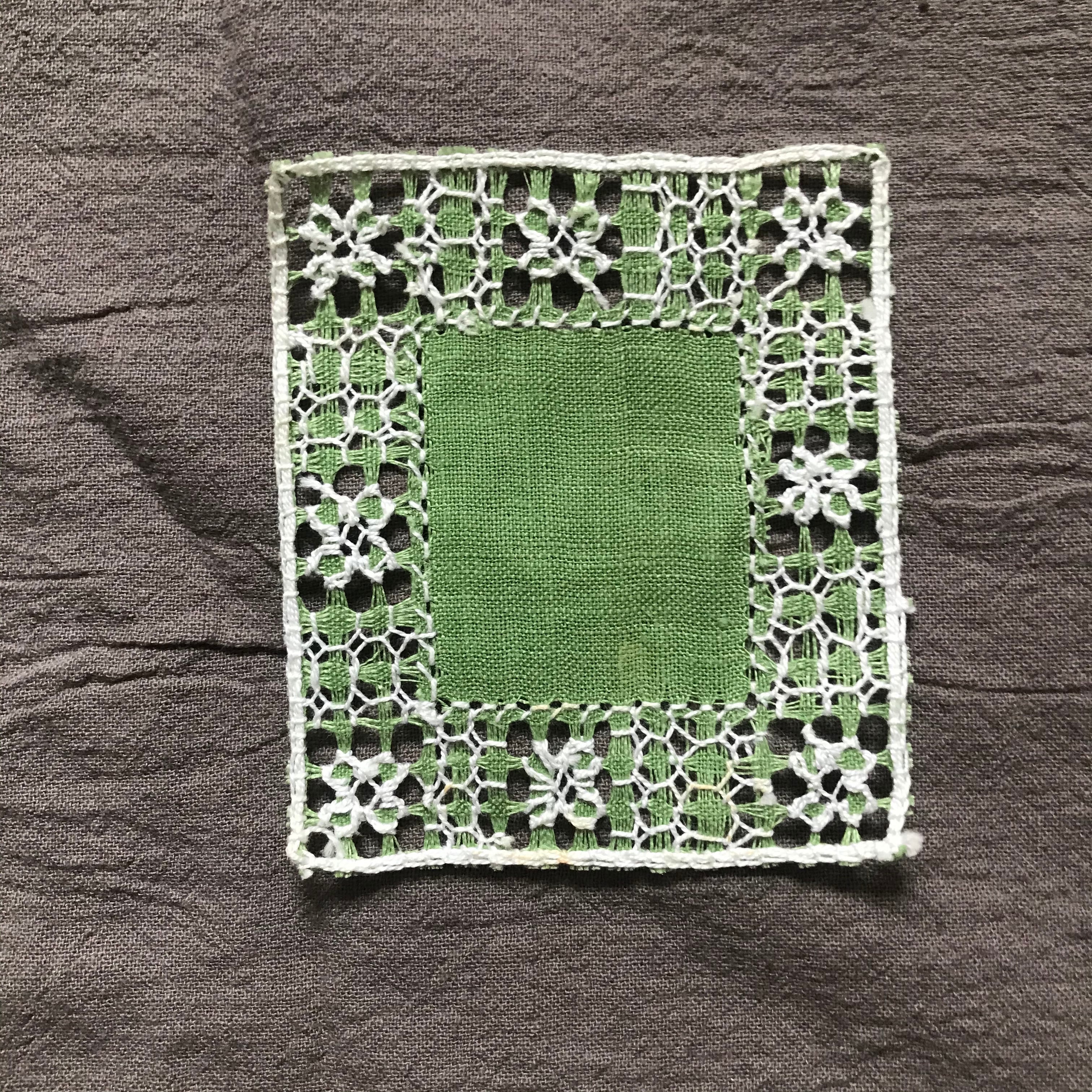 緑色のコースターな布