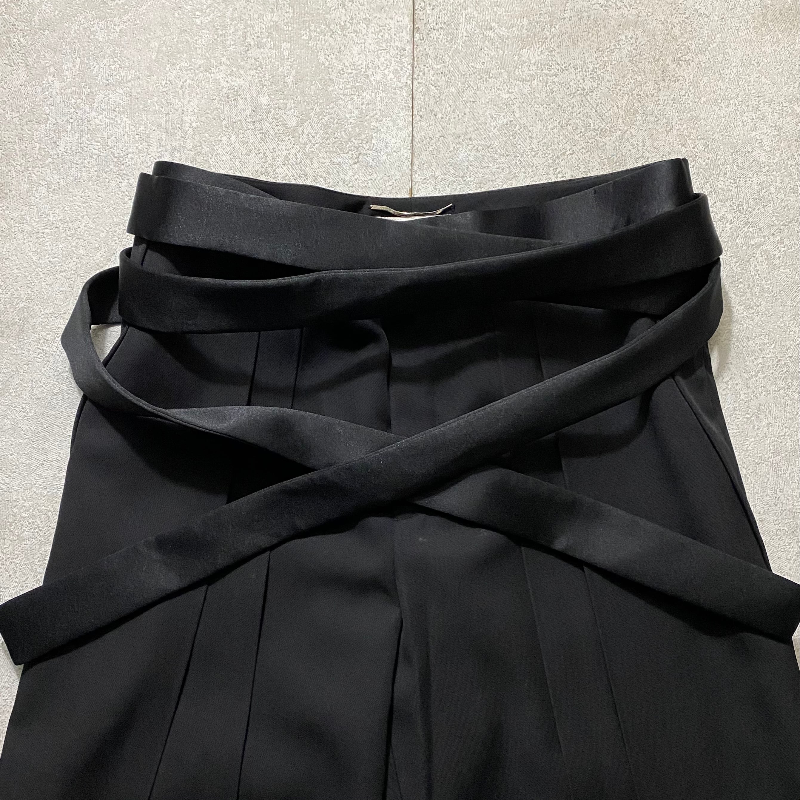 SAINT LAURENT PARIS pleated black “hakama” pants | NOIR ONLINE