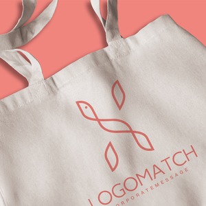 しなやかに交差する鳥Xのロゴ