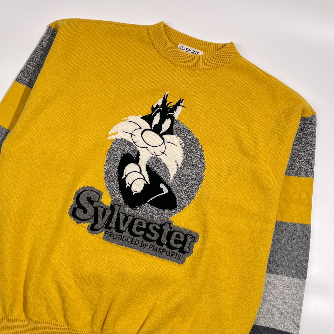 PIASPORTS ピアスポーツ ワーナー コラボ シルベスター ニット セーター 4/イエロー系 メンズ ゴルフ