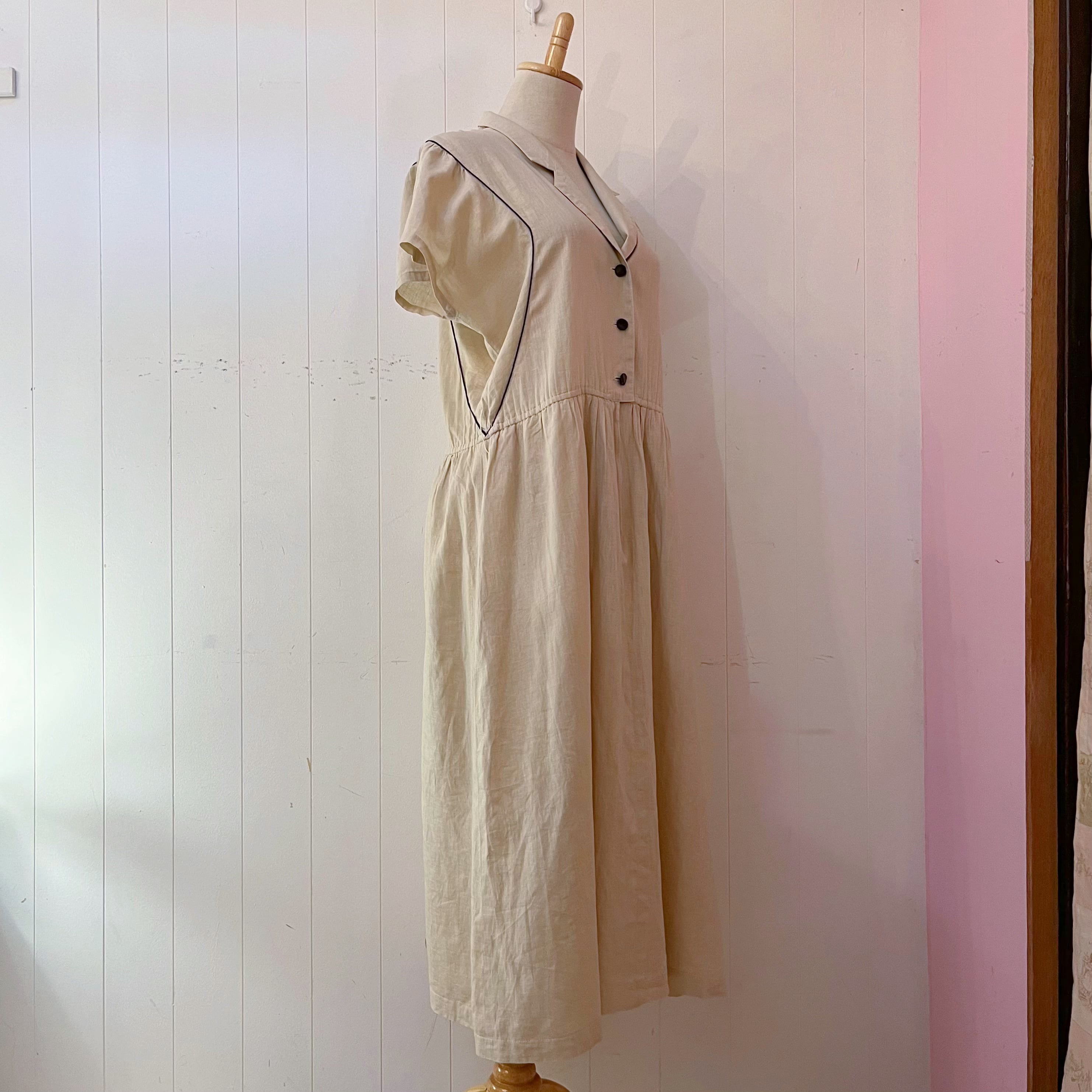 beige open collar one-piece