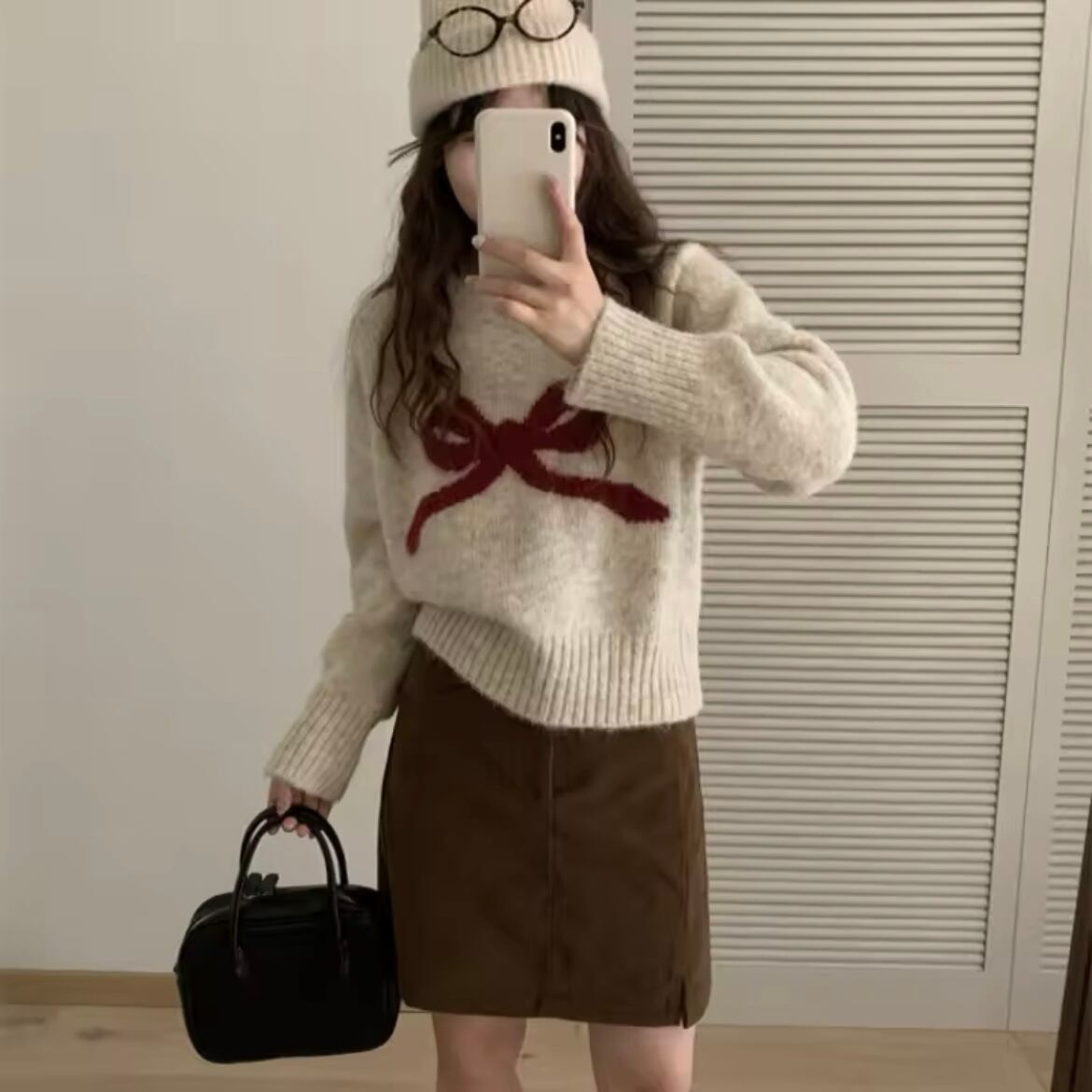 クルーネックリボンニット