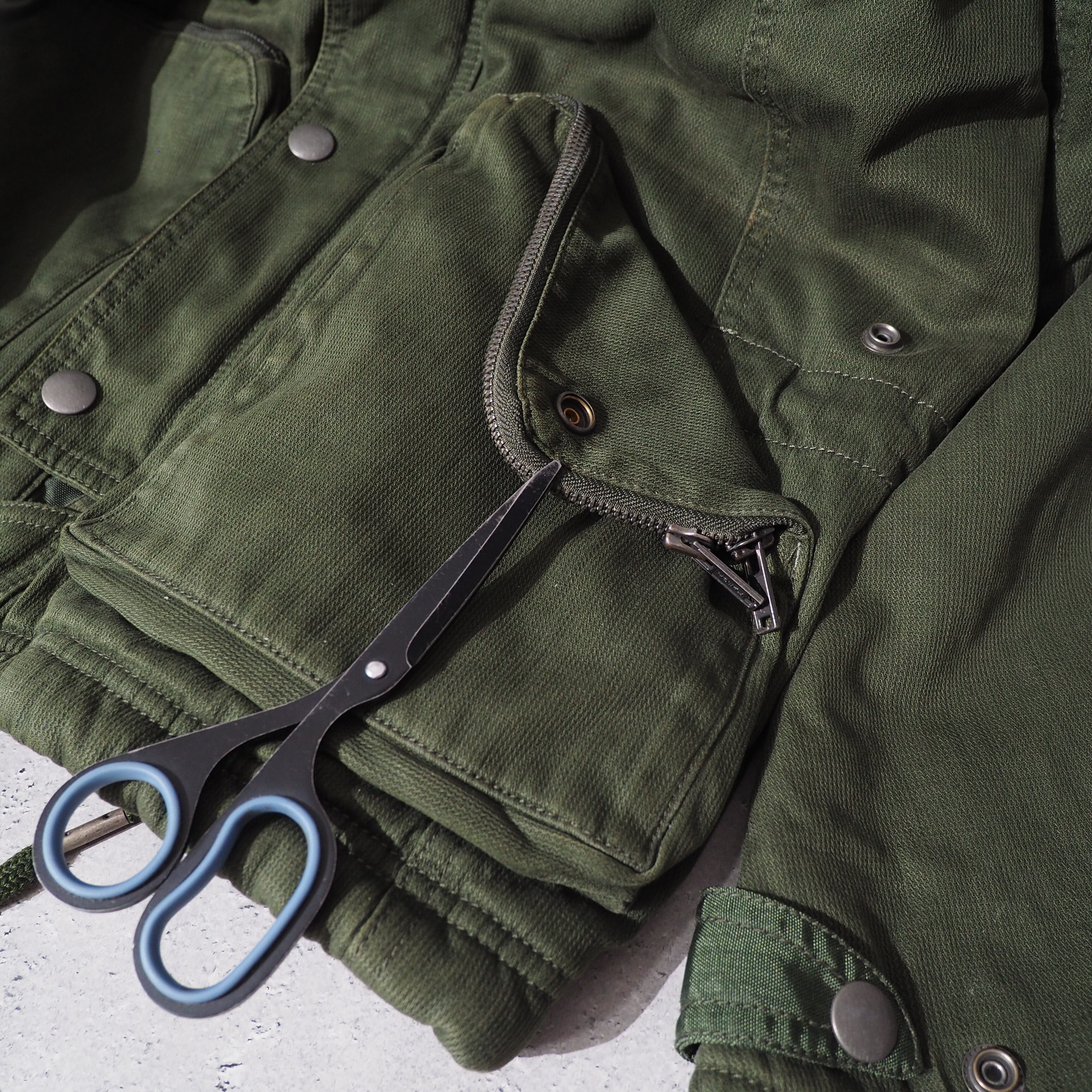 " DIESEL " Big Pockets × Switching nylon High neck Military jacket